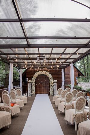 arch for wedding ceremony of flowers in the parkの写真素材
