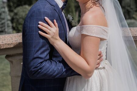 bride and groom in parkの写真素材
