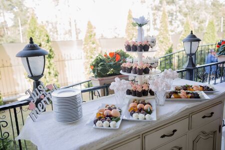 candy bar at wedding with sweetsの写真素材