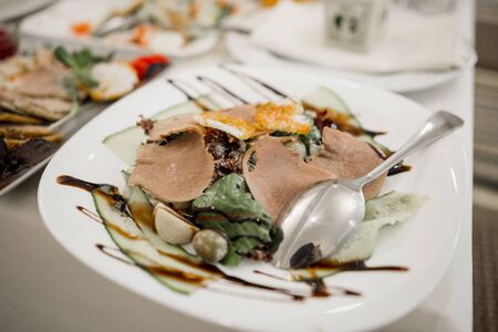 meat dish on a table in restaurantの写真素材