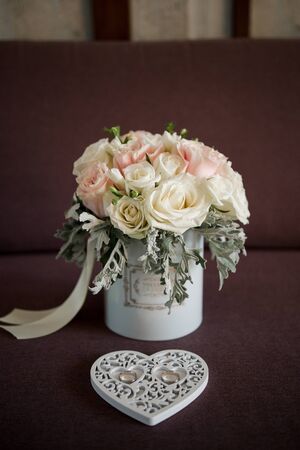 wedding rings with bouquet of the brideの写真素材