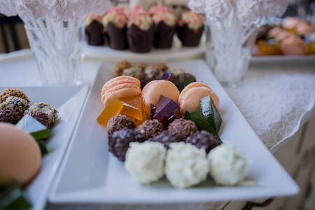 a candy bar with sweets at the partyの写真素材