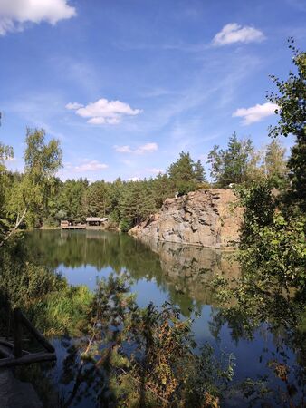 large lake in pine forestの写真素材