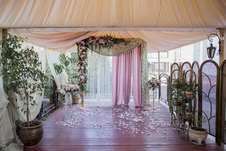 arch for wedding ceremony with flowersの写真素材