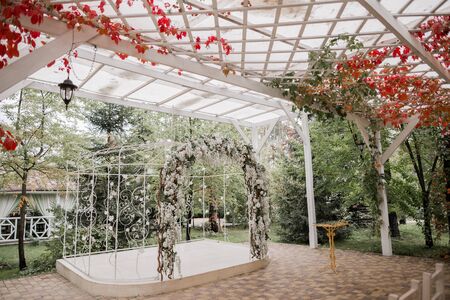 arch for wedding ceremony with flowersの写真素材