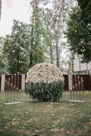arch for wedding ceremony with flowersの写真素材