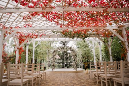 arch for wedding ceremony with flowersの写真素材