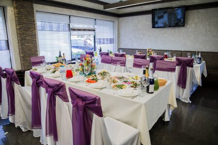 decor of a wedding table on holiday in restaurantの写真素材