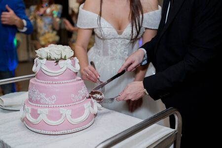 a wedding cake with wedding decorの写真素材