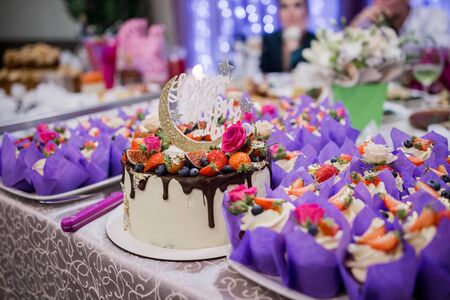 a wedding cake with wedding decorの写真素材