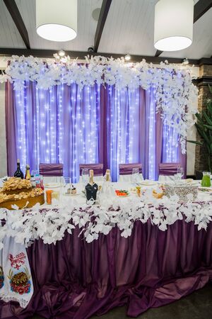 decor of a wedding table on holiday in restaurantの写真素材