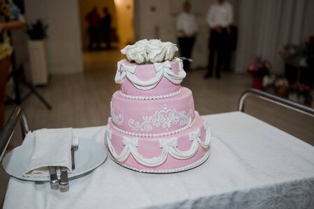 a wedding cake with wedding decorの写真素材
