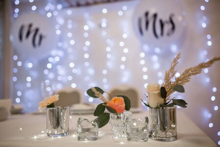 decor of flowers at a wedding in banquet hallの写真素材