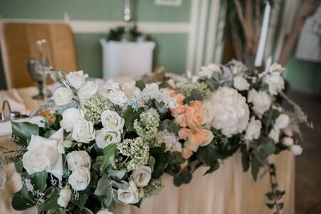 decor of flowers at a wedding in banquet hallの写真素材