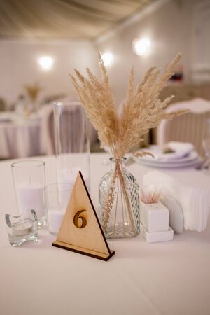 decor of flowers at a wedding in banquet hallの写真素材