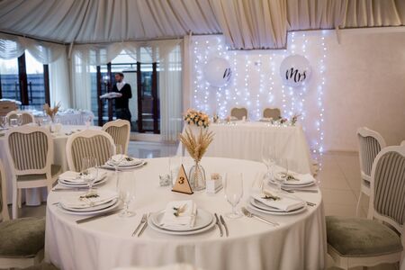 decor of flowers at a wedding in banquet hallの写真素材
