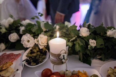 candles on a table in restaurant with decorの写真素材