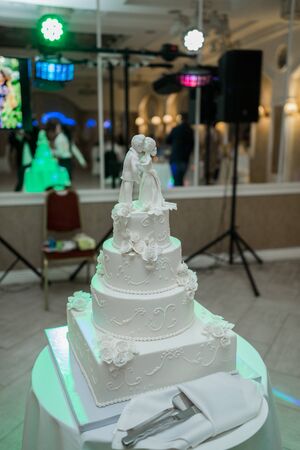 large white wedding cake in eveningの写真素材