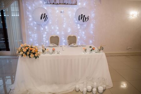 decor of flowers at a wedding in banquet hallの写真素材
