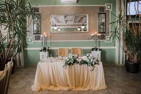 decor of flowers at a wedding in banquet hallの写真素材
