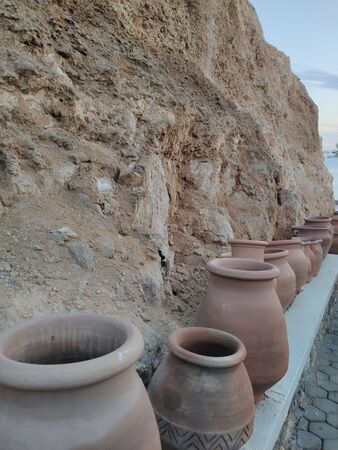 a clay jugs on the sand in egyptの写真素材