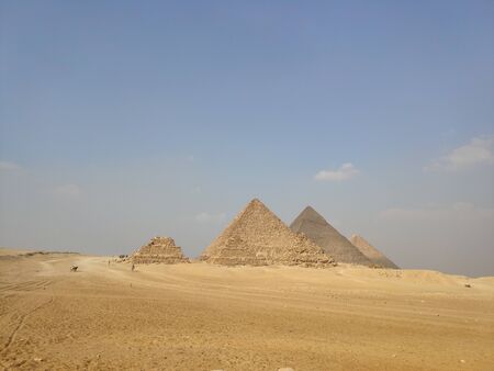 Egyptian pyramids in desert during the dayの写真素材