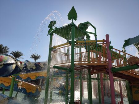 children's water park in pool in summerの写真素材