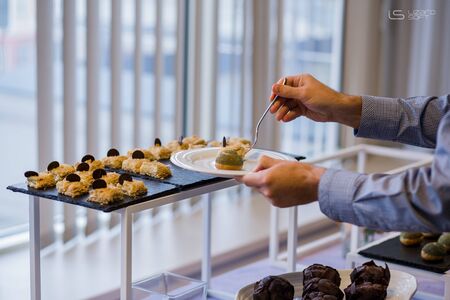 food and snacks on the buffet table in restaurantの写真素材