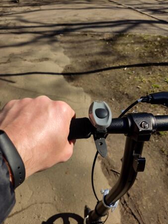 black scooter wheel on roadの写真素材