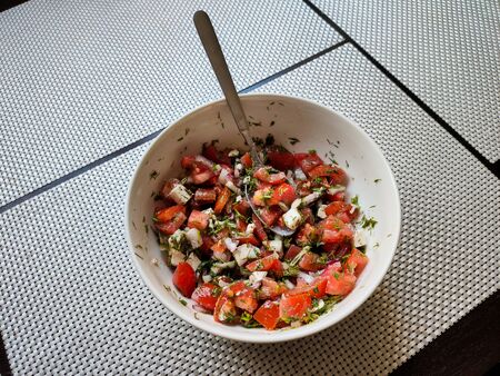 vegetable salad in white bowlの写真素材