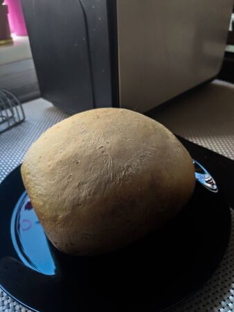 homemade bread on kitchen tableの写真素材