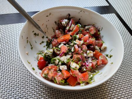 vegetable salad in white bowlの写真素材