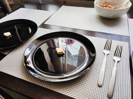 a plates on the home kitchen tableの写真素材