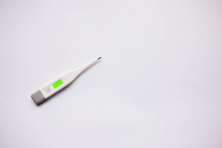 electronic thermometer on white backgroundの写真素材
