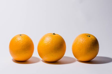 an oranges on a white backgroundの写真素材