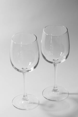 empty wine glasses on white backgroundの写真素材