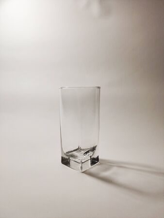 empty wineglass on a white backgroundの写真素材