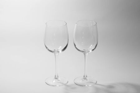 empty wine glasses on white backgroundの写真素材