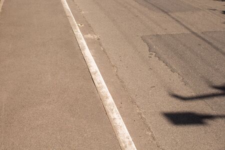 an asphalt and edge on the roadwayの写真素材