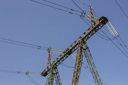 high voltage power lines in forestの写真素材