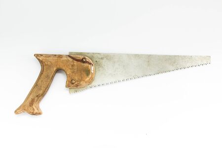 vintage hacksaw for wood on white backgroundの写真素材
