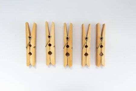 wooden clothespins on white backgroundの写真素材