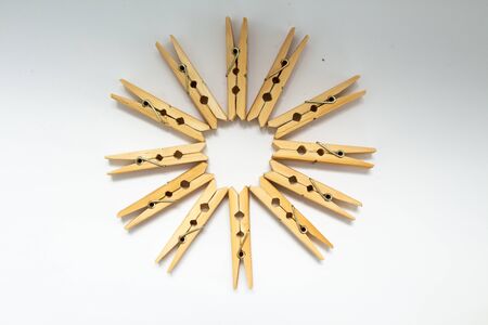 wooden clothespins on white backgroundの写真素材