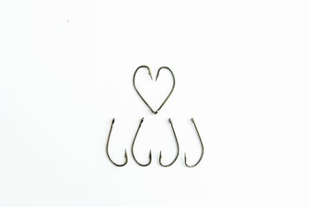 fishing hooks on white backgroundの写真素材