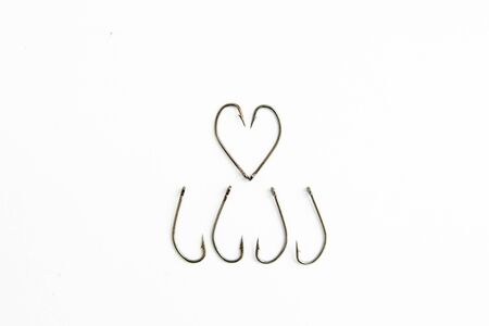 fishing hooks on white backgroundの写真素材