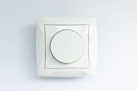 round light switch on white backgroundの写真素材