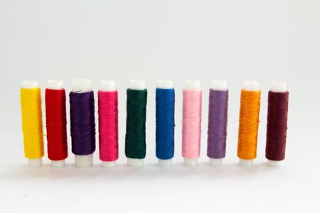 collage threads for sewing different colorsの写真素材