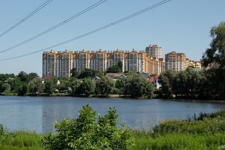 apartment building on a lake in parkの写真素材