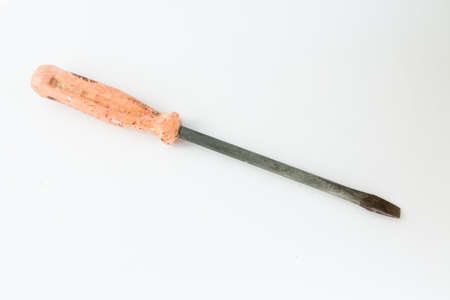 old screwdriver on white background