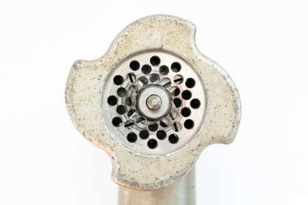 iron meat grinder on white backgroundの写真素材